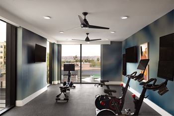 Glass-enclosed fitness center with yoga flex room